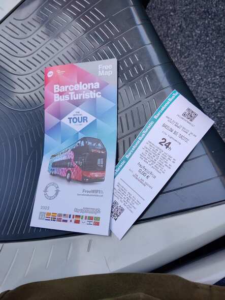Barcelona bus tour ticket, city map and headphones